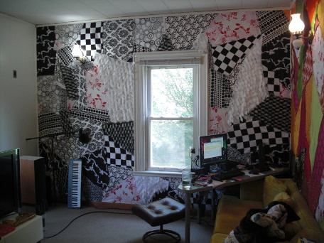 a wall covered in monochromatic fabrics